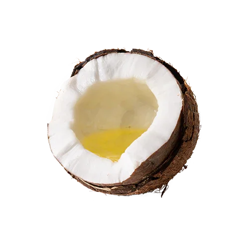 Half of a brown coconut shell with white flesh and a small pool of yellow coconut oil inside